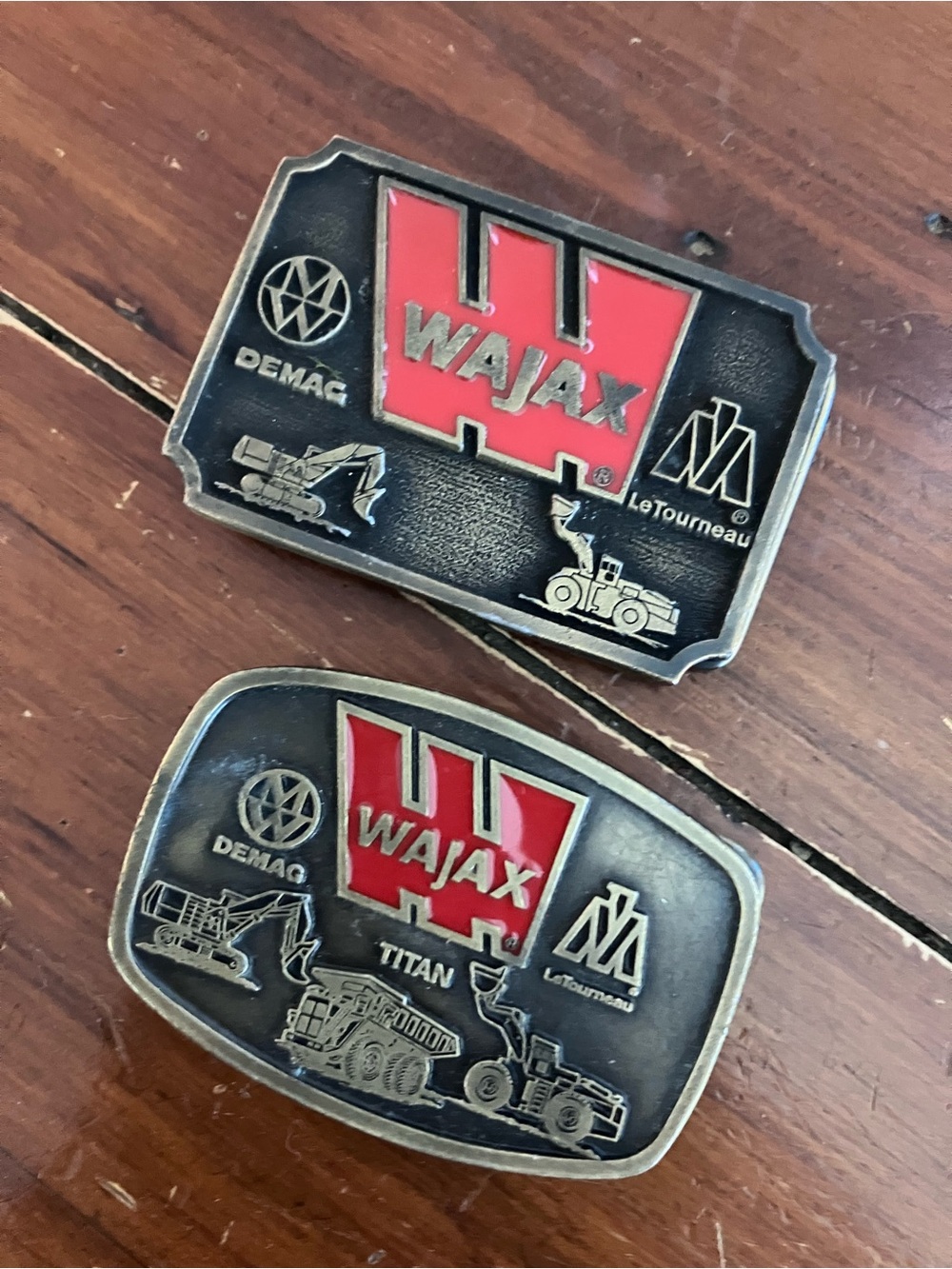 2 Wajax Red and Black Logo metal  Belt Buckles.  Made in Canada!